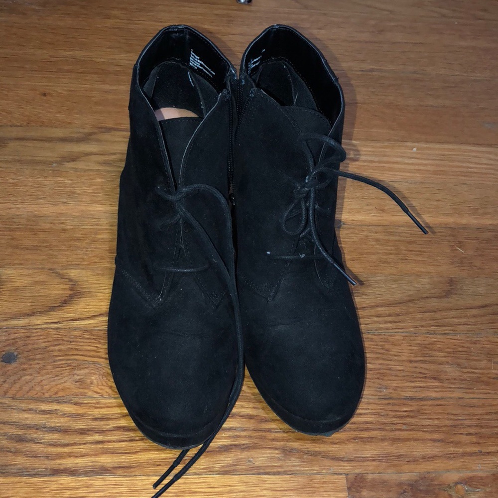 Black suede heeled booties with laces